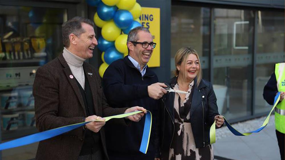 Local 'footballing legend' opens relocated MKM branch image
