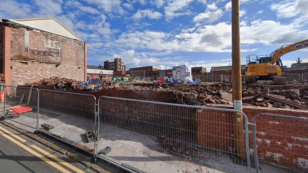 Travis Perkins ordered to demolish warehouse built without planning permission image